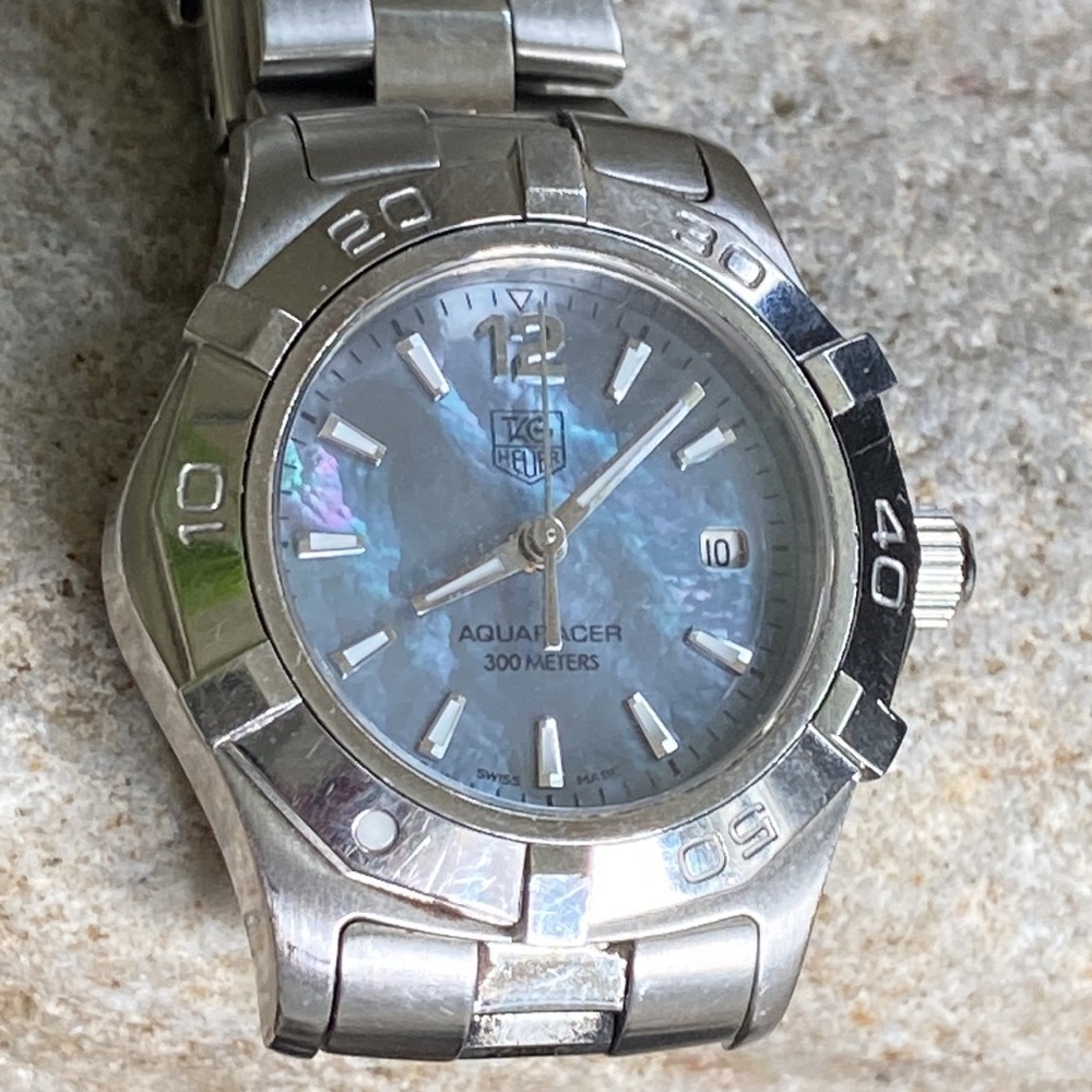 Tag Heuer watch with light blue mother of pearl  face